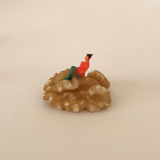 Using miniature people to creating miniature world and scenes with basic household and natural items.