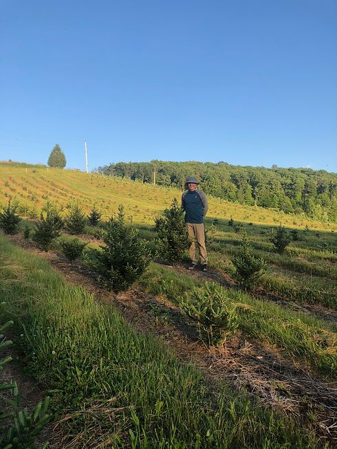 Owner, Larry, at Tuckaway Tree Farm