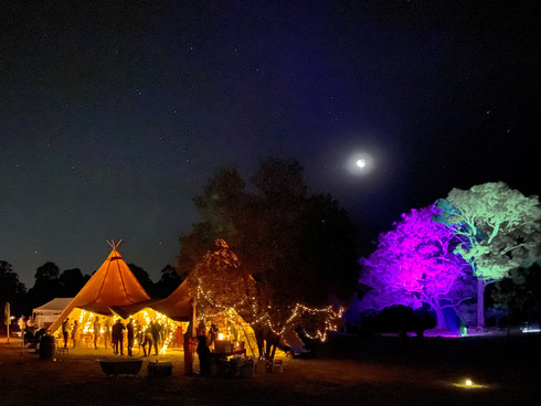 Tipis lit up and night