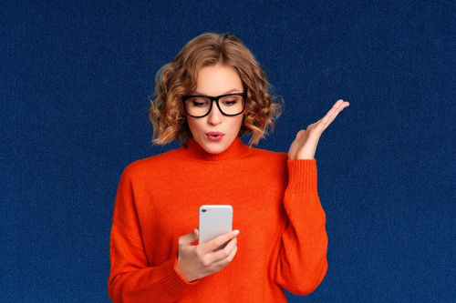 Confused woman looking at phone - AI colour analysis giving wrong results - Colour Me Coach Sydney