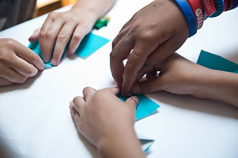 little hands folding papers