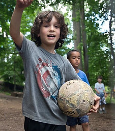 running with soccer ball