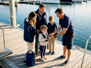 Family receiving private boat safety briefing