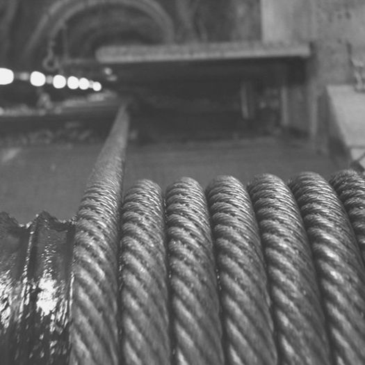 Spool of wire rope that is headed deep into a mine shaft