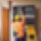 An Electrician doing electrical inspections from behind.jpg
