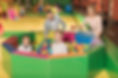 happy-parents-looking-at-cute-little-kids-smiling-2024-11-14-19-54-08-utc.jpg