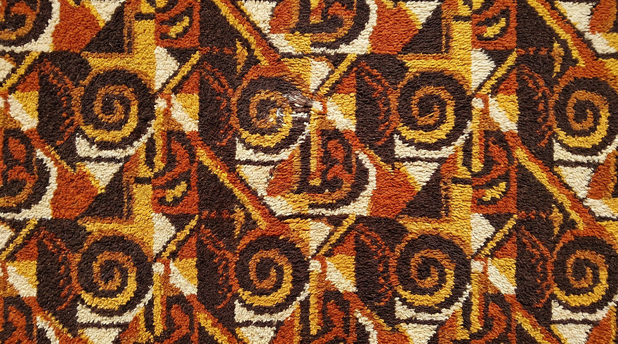 Illustration of a nostalgic 1970s orange and brown patterned shag carpet background.