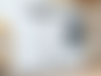 Modern laundry room featuring a washer and dryer, highlighting potential condensation issues caused by dryers in enclosed spaces.