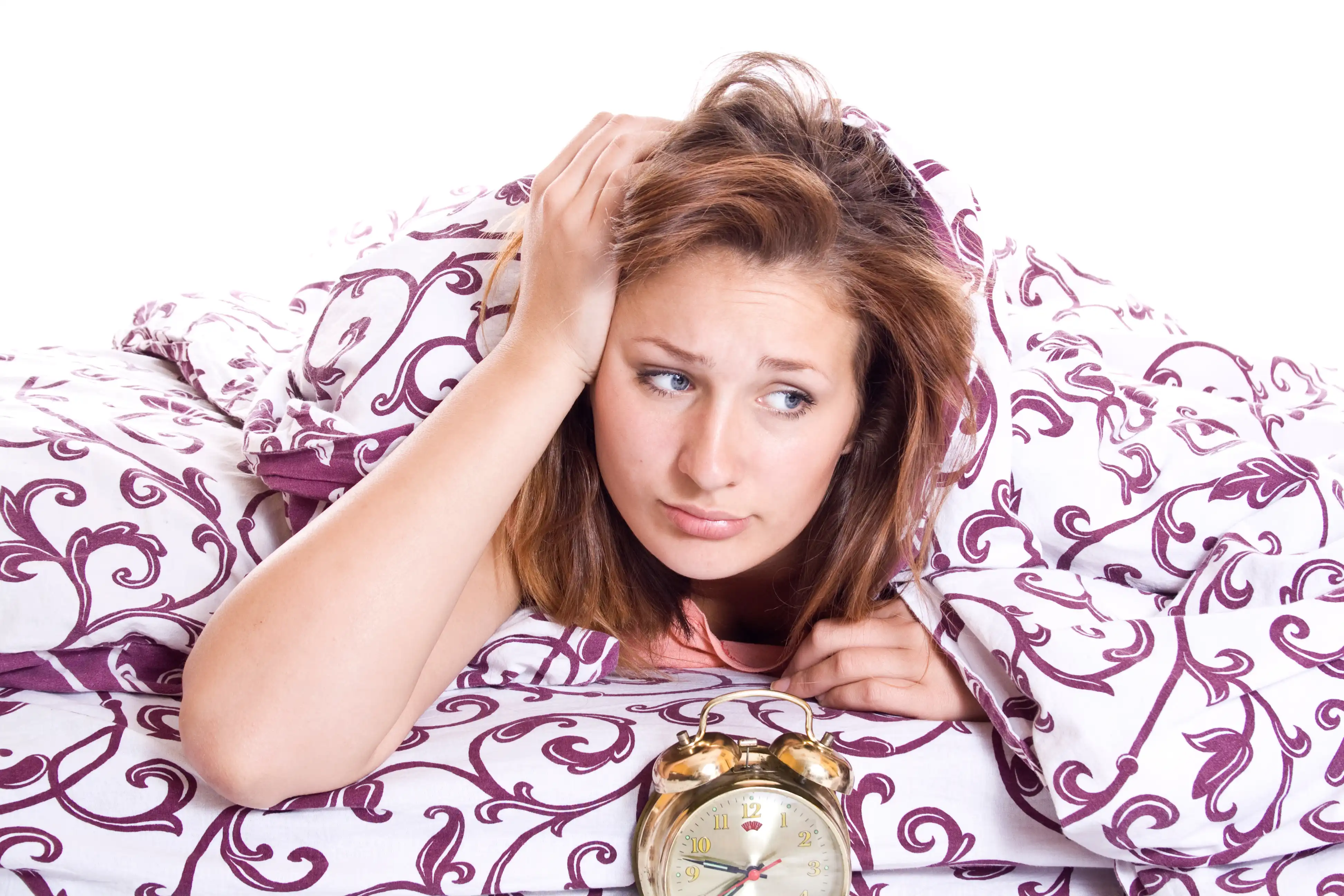 woman affected by jet lag trying to sleep