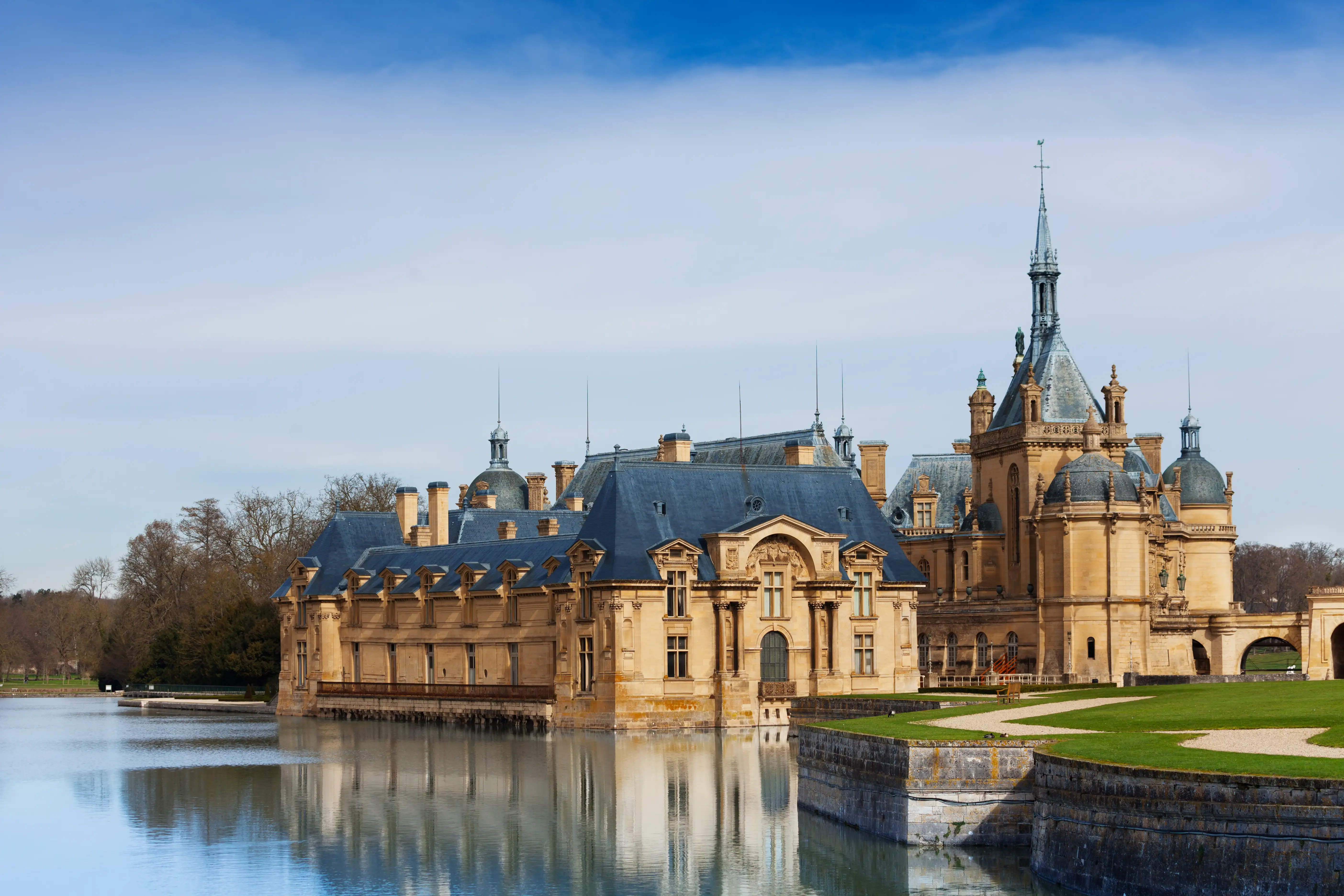 Fairytale Chateau de Chantilly at sunny day