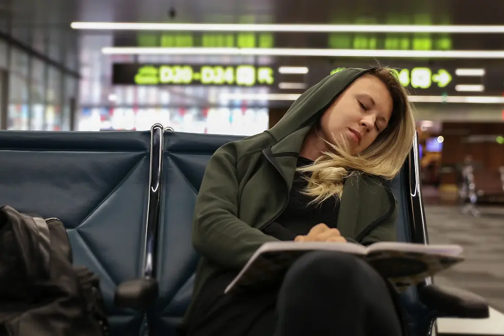 woman sleeping during a layover