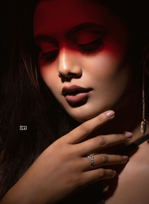 Creative studio fashion shoot with dramatic lighting