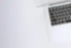 topdown view of only a third of an open laptop