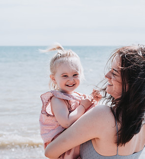 Outdoor mother and daughter family photography session at the beach in Warmer, kent. Summer photoshoot