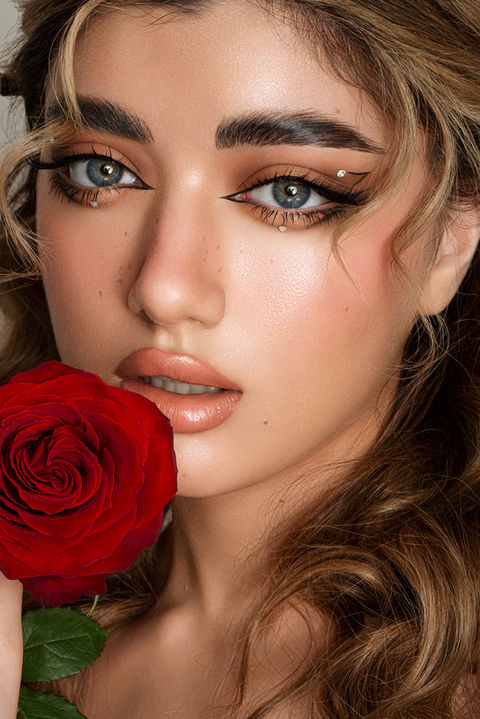 Young woman with a rose.