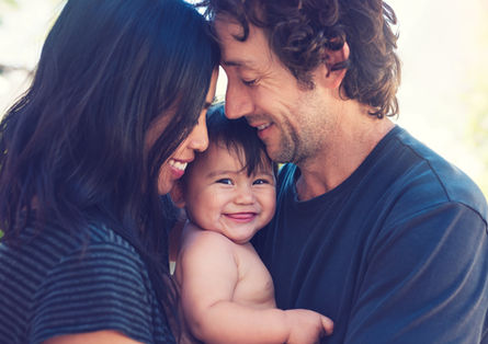 Happy Family with Baby Boy - Best family photographers in Dubai