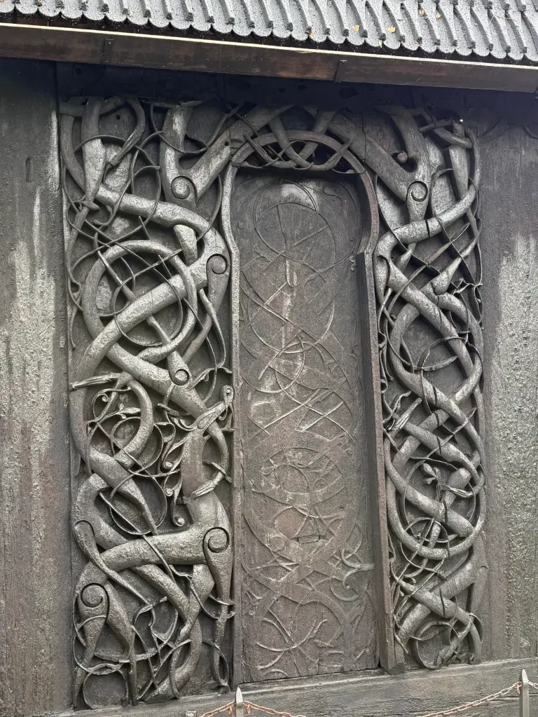 Carved wooden panel from the 11th century - Urnes Stave Church Norway