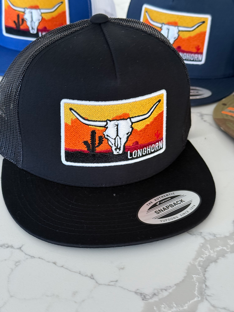 Thumbnail: Black Orange Desert Trucker