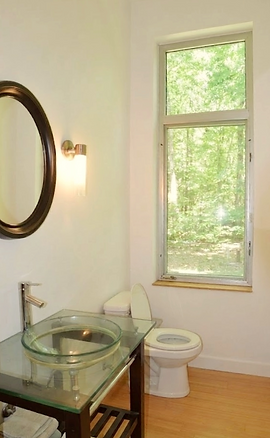 Powder room vanity with glass top