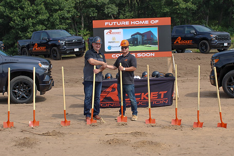 Gregg and Justin Shaking Hands Over New Build