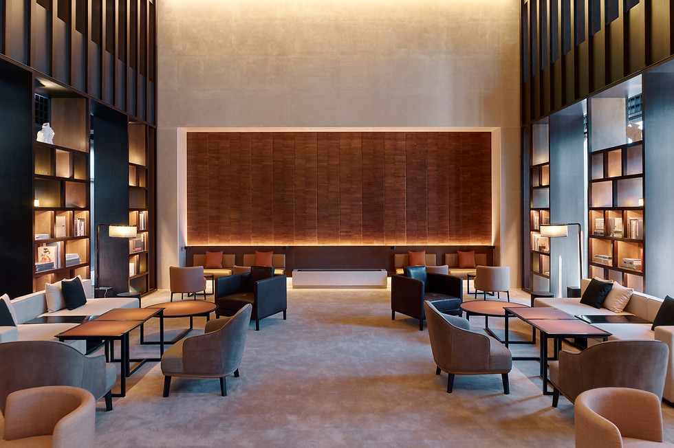 Lounge setting with book shelves and wooden board