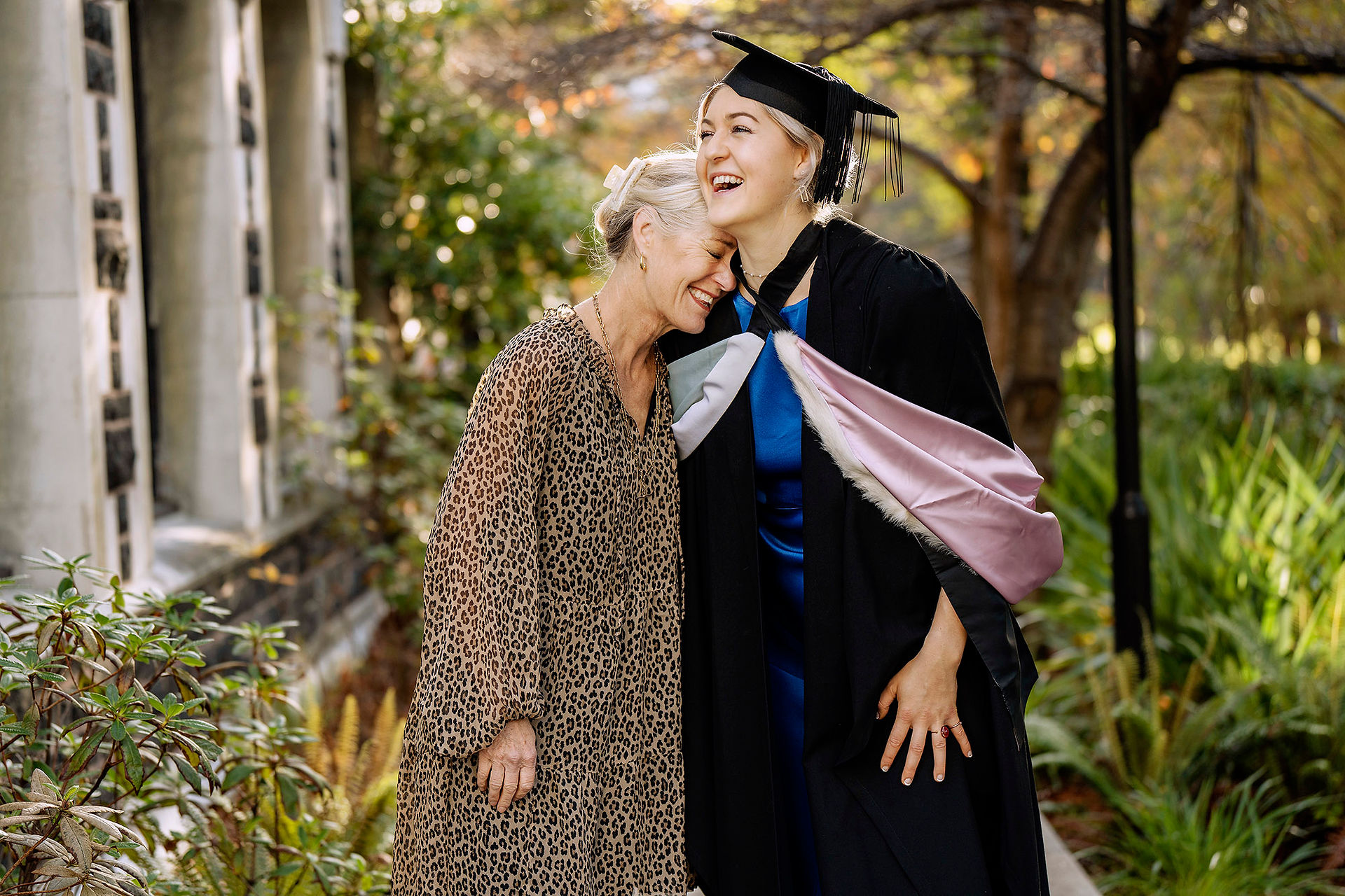 Dunedin Graduation on campus Mother and Daughter laughing - Angela Haig Photography