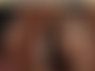 A woman looking herself in the mirror