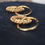 Miniaturbild: Golden Ring through round Hoops