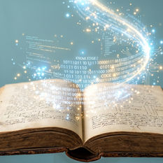 photographie-ancien-livre-ouvert-dont-sechappent-datas-numeriques