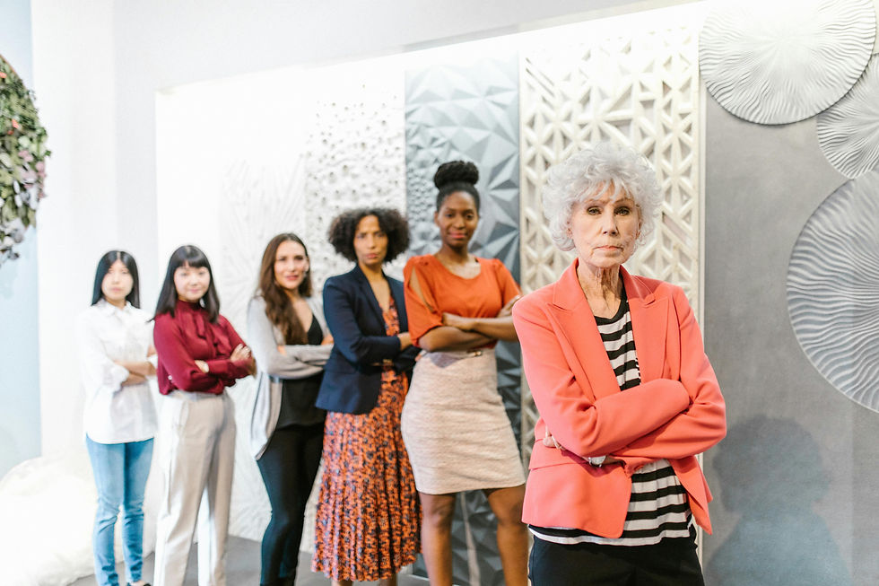A line of business women of diverse ages and race looking confident and ready to take action