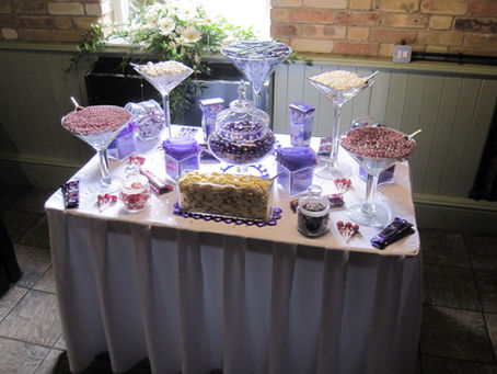sweets table purple cooling castle barn