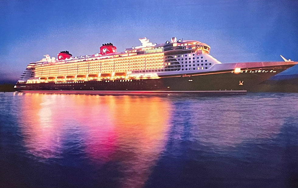 Disney cruise ship at dusk, with illuminated decks and red funnels reflected in calm water.