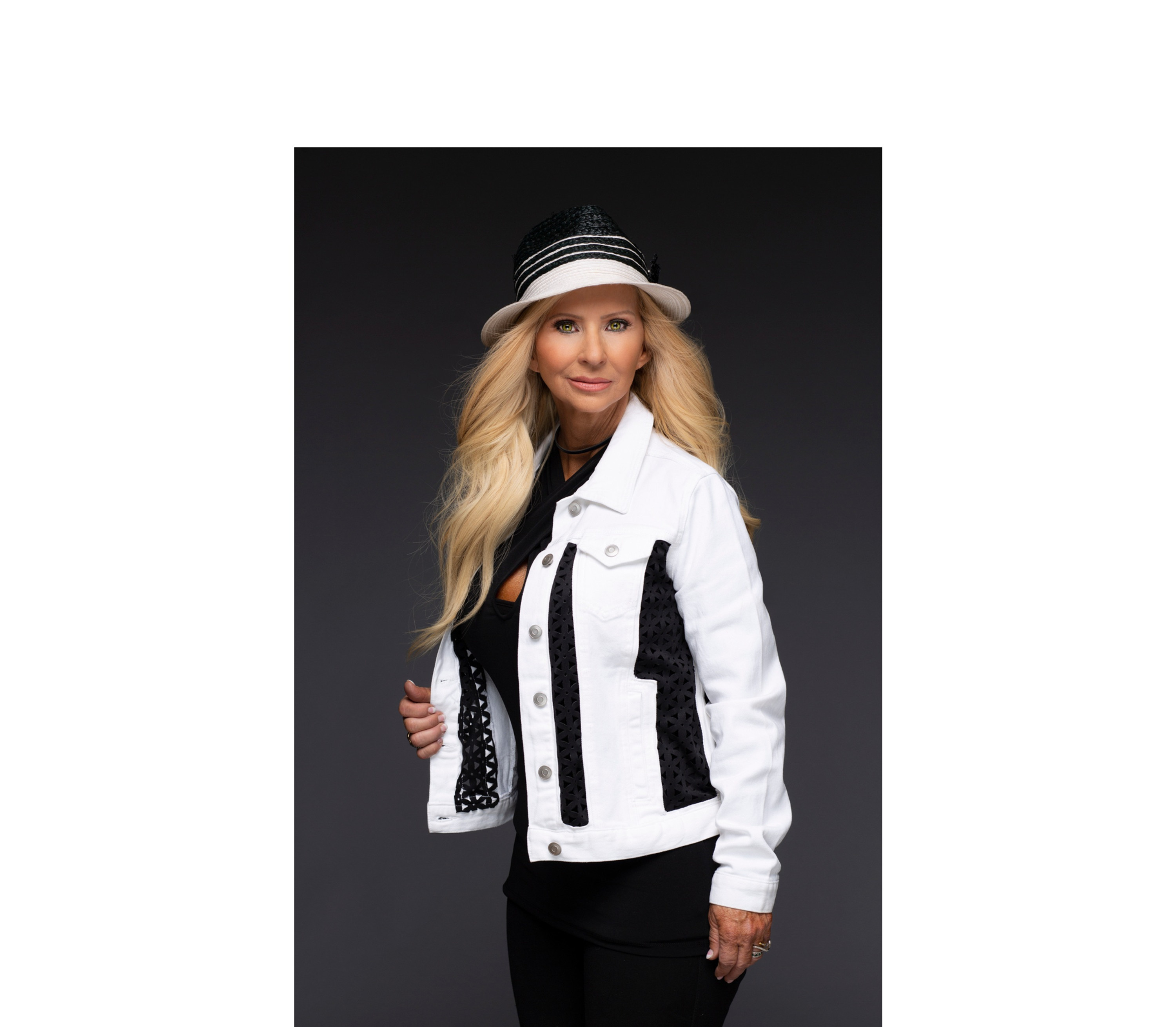White denim jacket with black breathable fabric inserts