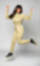 Woman jumping in scrubs