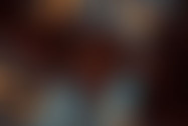 woman laying down on the floor surrounded by candles in a stunning image captured by LJ Jacobs of Luscious Rebel Intimate Artistry in Kitchener