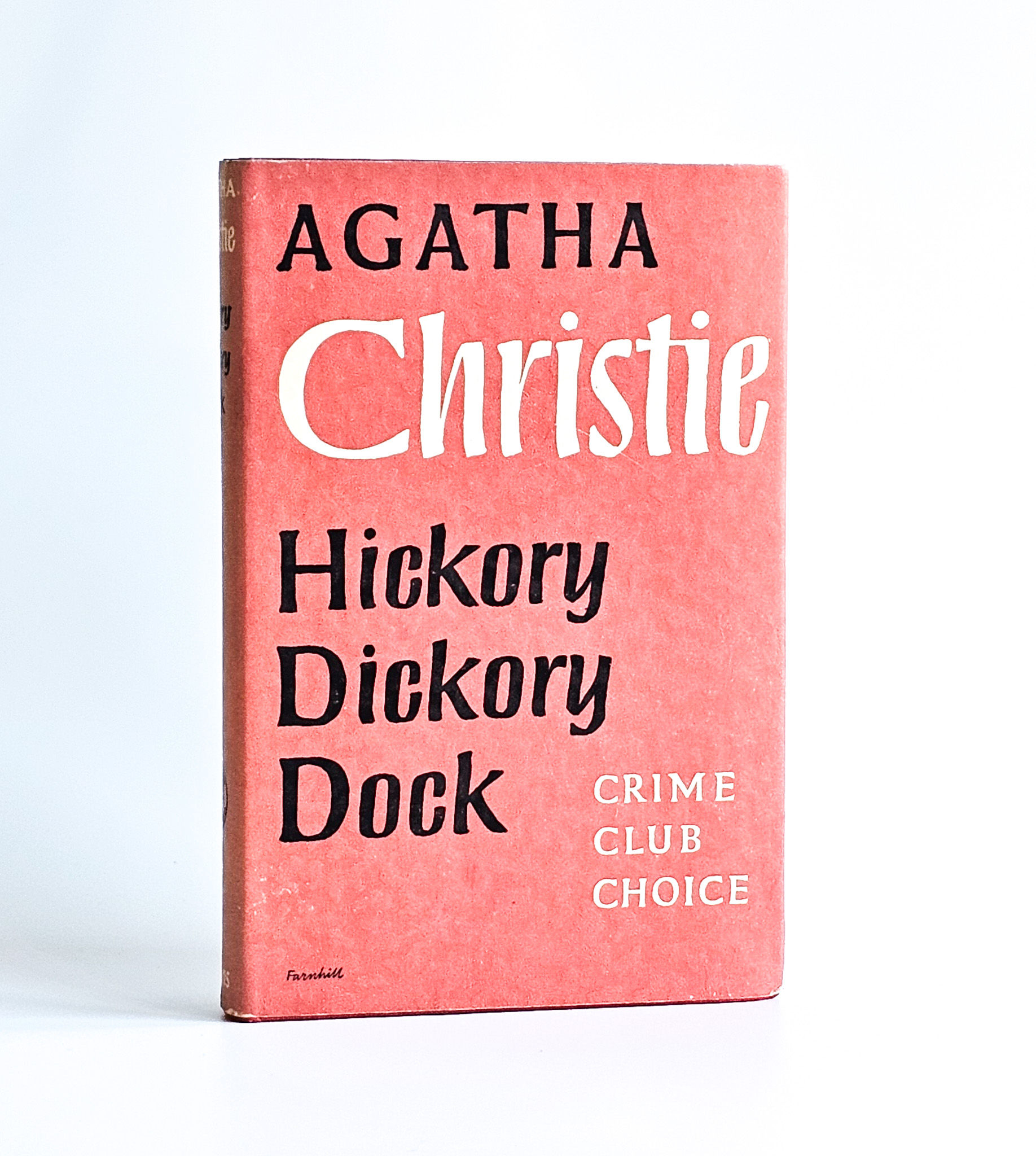 Front dust jacket of Agatha Christie’s Hickory Dickory Dock first edition, Collins 1955, red Crime Club jacket.