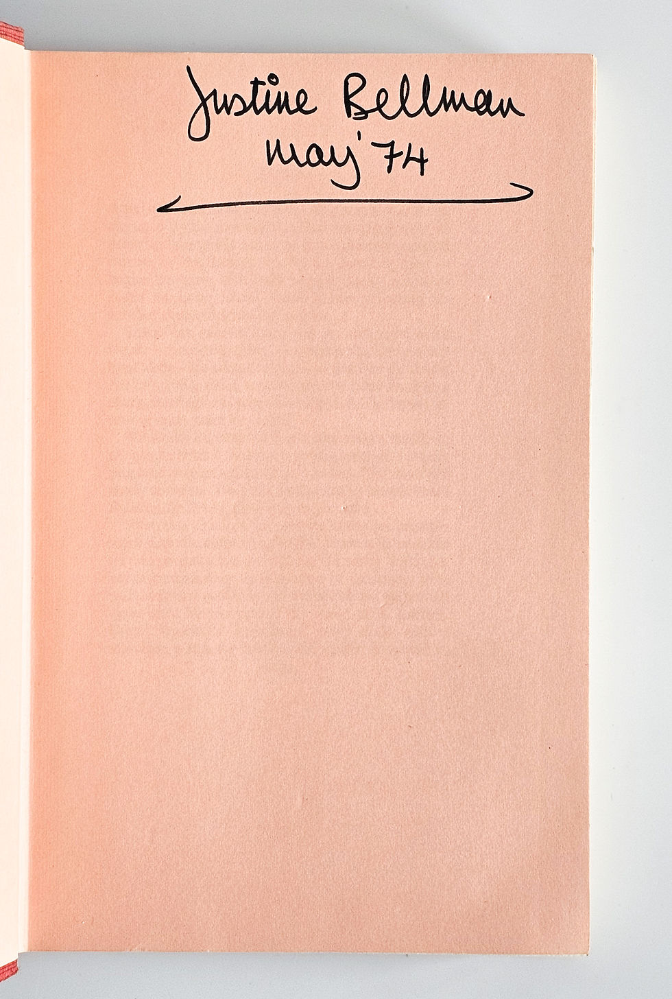 Thumbnail: Light pink front free endpaper of the 1974 Jaws first UK edition with a previous owner's name dated May 1974