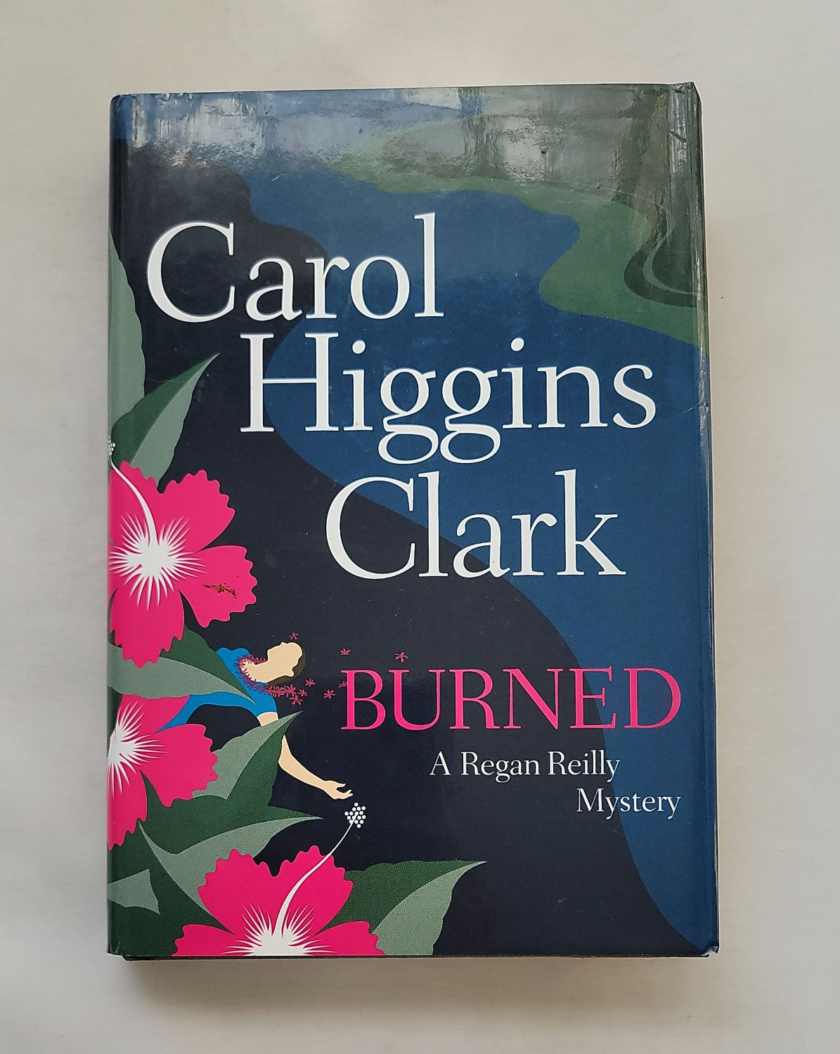 Burned: A Regan Reilly Mystery by Carol Higgins Clark