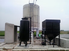 one black vessel and one tank, one large vessel