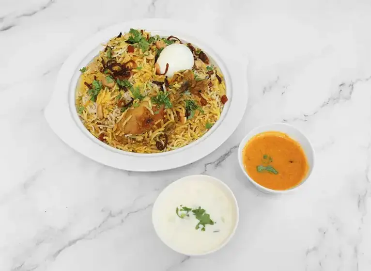 53501496 - Chicken dum biryani.webp