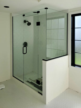 Frameless glass shower