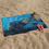 Thumbnail: Blue ocean beach towel with Psalm 23:2 design, Christian faith-based accessory by Abundant Life™ for ManyPots®.
