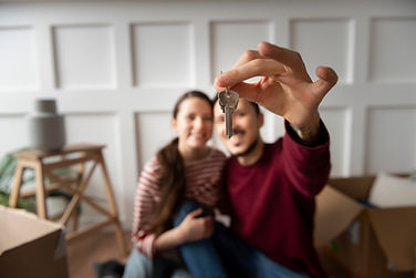 young-couple-moving-into-new-home.jpg
