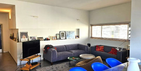 A large living room in an apartment for sale near Yehoshua Ben Nun and Basel Tel Aviv