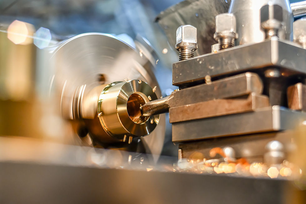 turner-bores-hole-bronze-part-lathe-with-power-tool.jpg