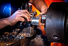 industrial-engineering-wearing-safety-clothing-using-vernier-calipers-measuring-instrument