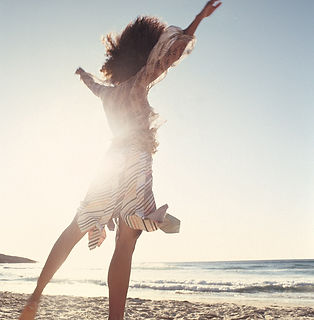 Woman Jumping Beach