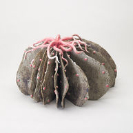 Brown and pink anemone form. Raw clay and porcelain tendrils. Ceramic art piece.