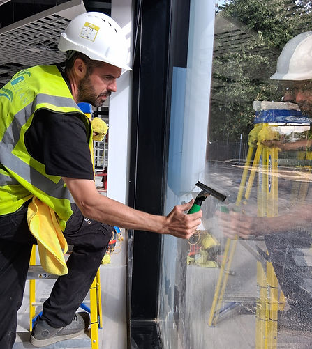 Professional traditional window cleaning delivering a clear, polished finish on commercial windows.