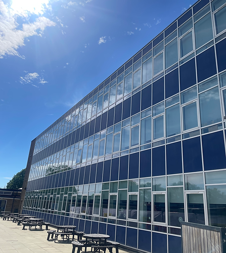 Reach‑and‑wash external window cleaning on a school building for a spotless, streak‑free finish.